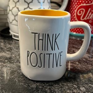 Rae Dunn “Think Positive” mug with yellow inside